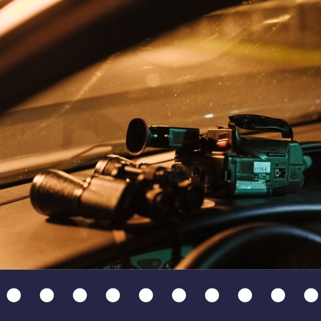 Surveillance equipment on dashboard of a car