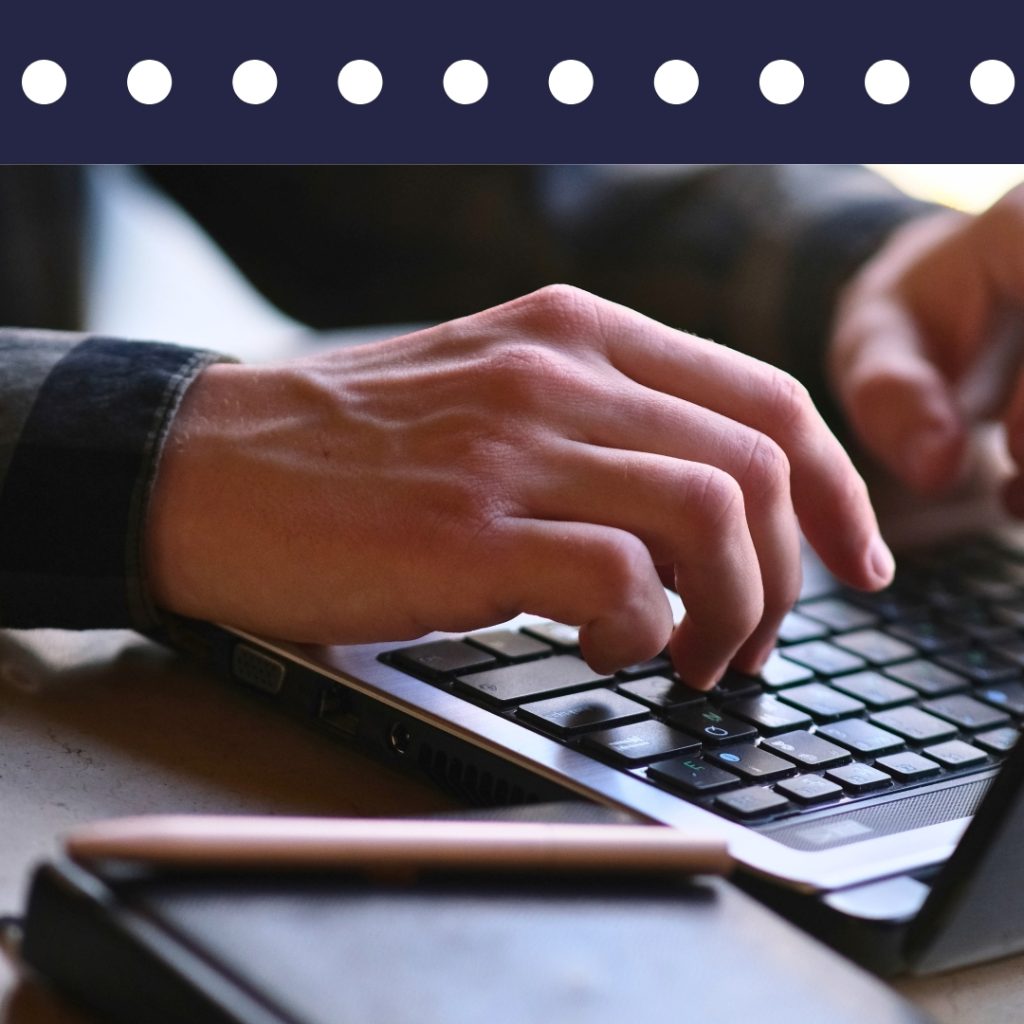 Private investigator researching a case on a laptop