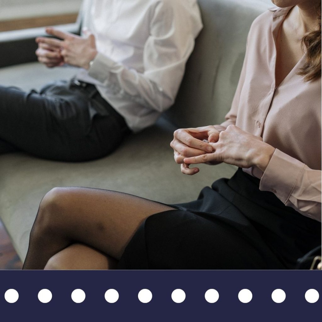 Couple removing wedding rings representing divorce proceedings and financial investigation needs – Blue Falcons Investigation